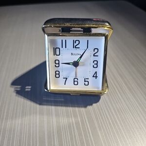 Bulova Quartz Travel Alarm Clock Black Gold Folding Case 1970s Vintage PreOwned